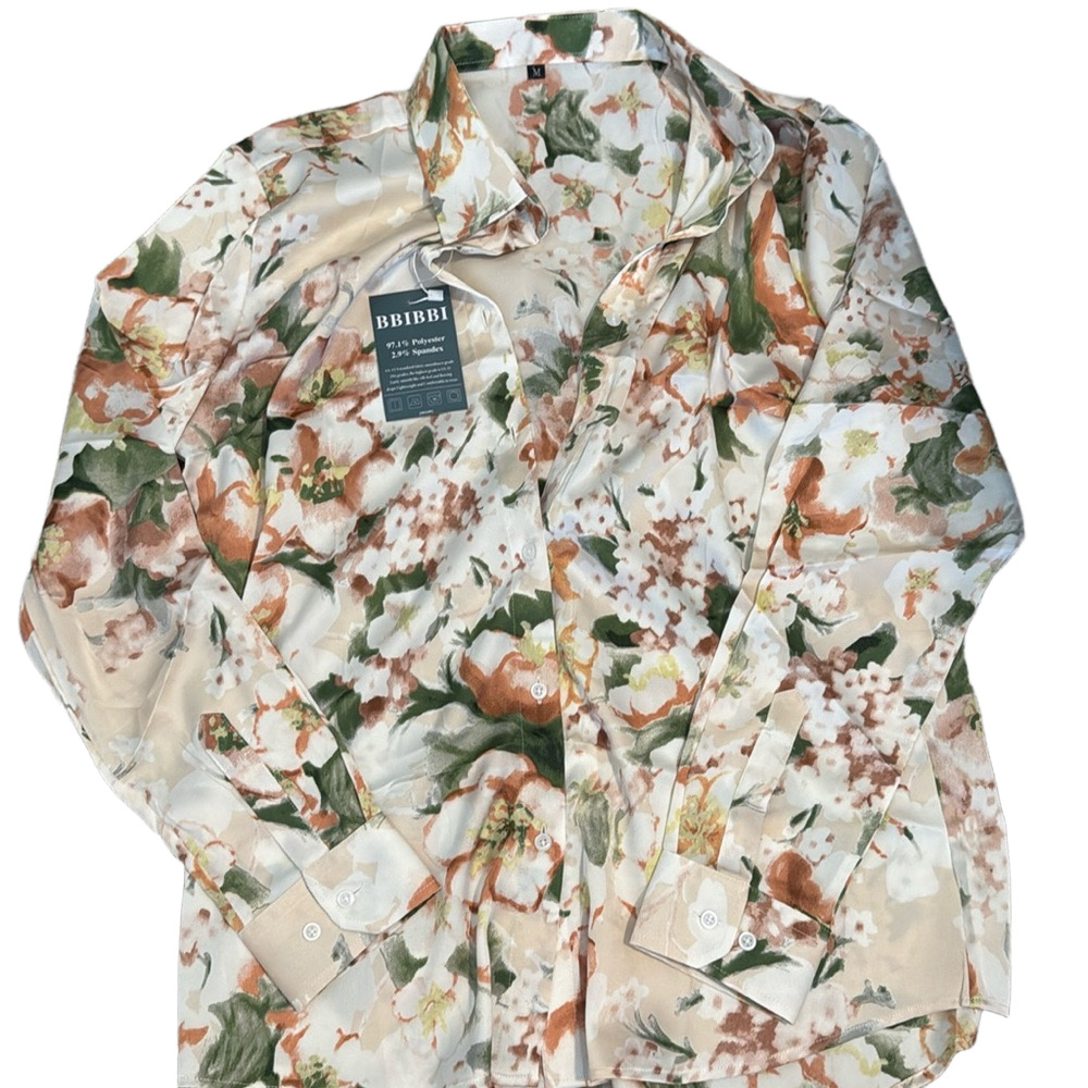 NWT. Trendy women’s floral silk button-down office wear casual wear.